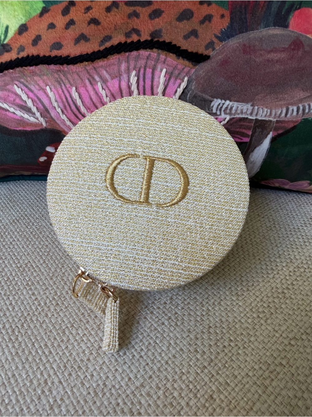 Dior Round Jewelry Case in Gold and Cream with Gold CD Logo.